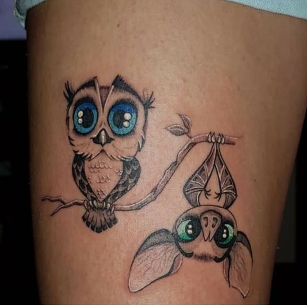 Tatouage arbre fantastique sur le mollet