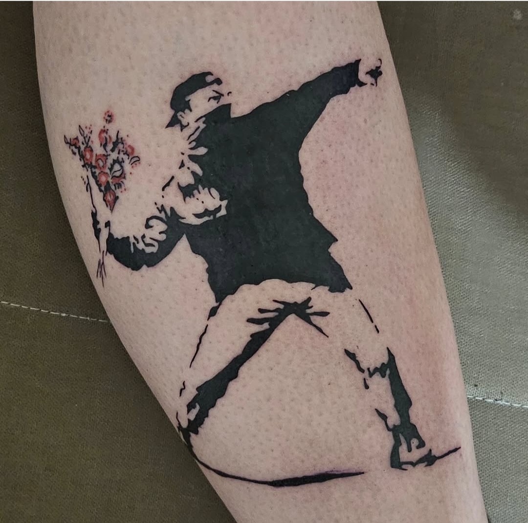 Tatouage silhouette au bouquet